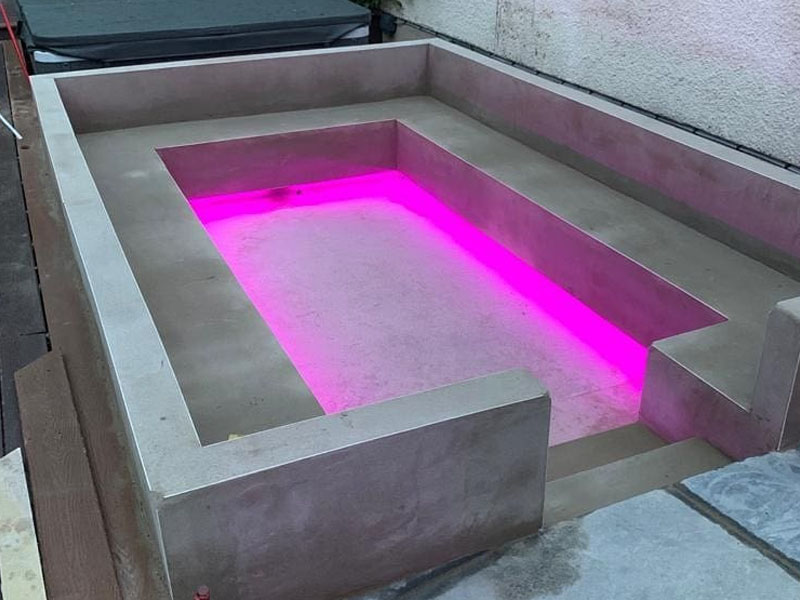 Example of hidden lighting of various colours under seating